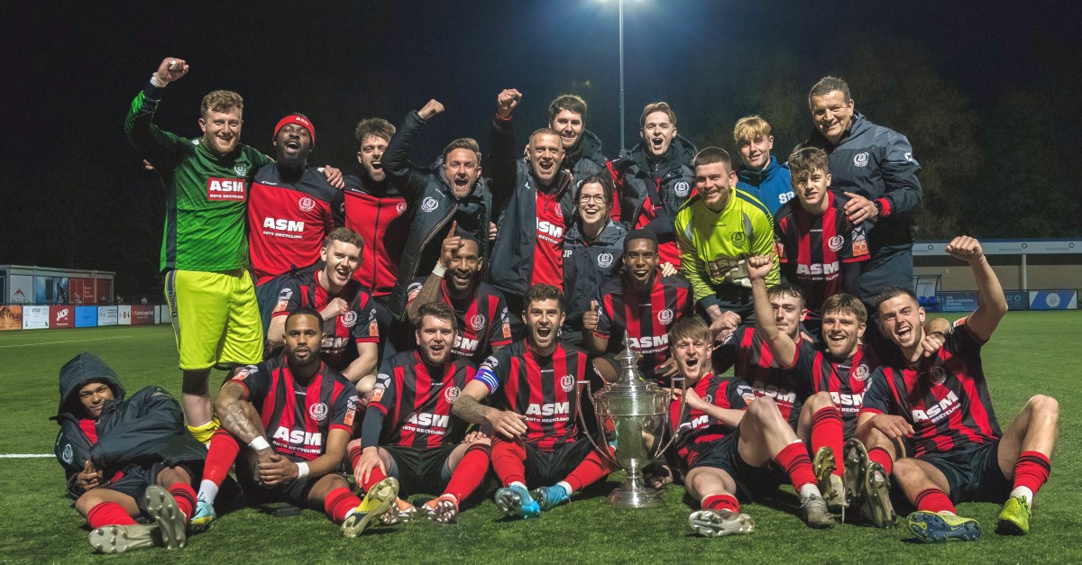 Thame United FC players celebrating their 2023 Oxfordshire Senior Cup win