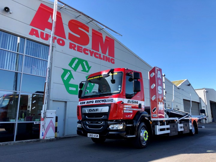 Car transporter at ASM Auto Recycling in Thame, Oxford