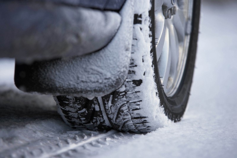 Tyre and tracks in snow