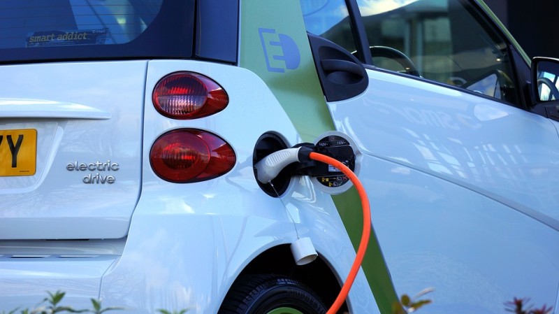 Electric vehicle connected to charging station