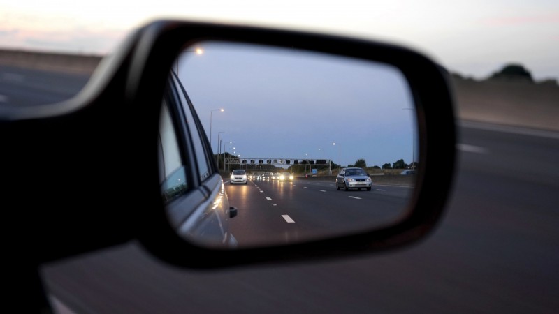 Wing mirror viewing motorway traffic